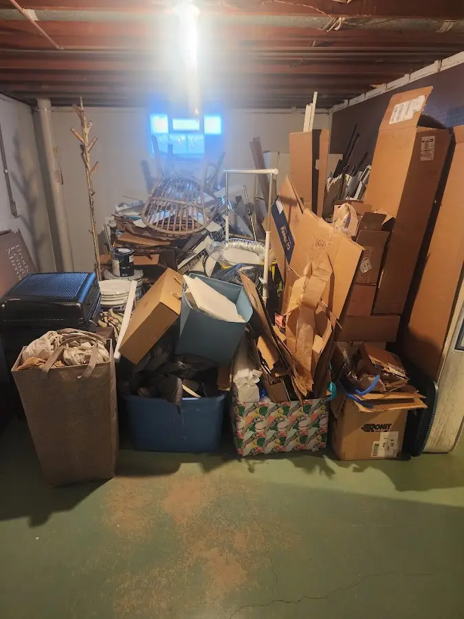 Roll-off dumpster container at job site for Yard Waste Dumpster Rental in Sweetwater